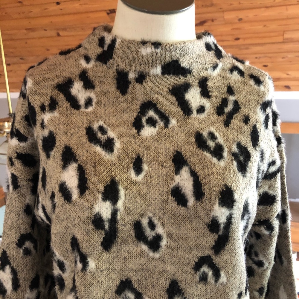 Fuzzy leopard print mock turtle neck sweater